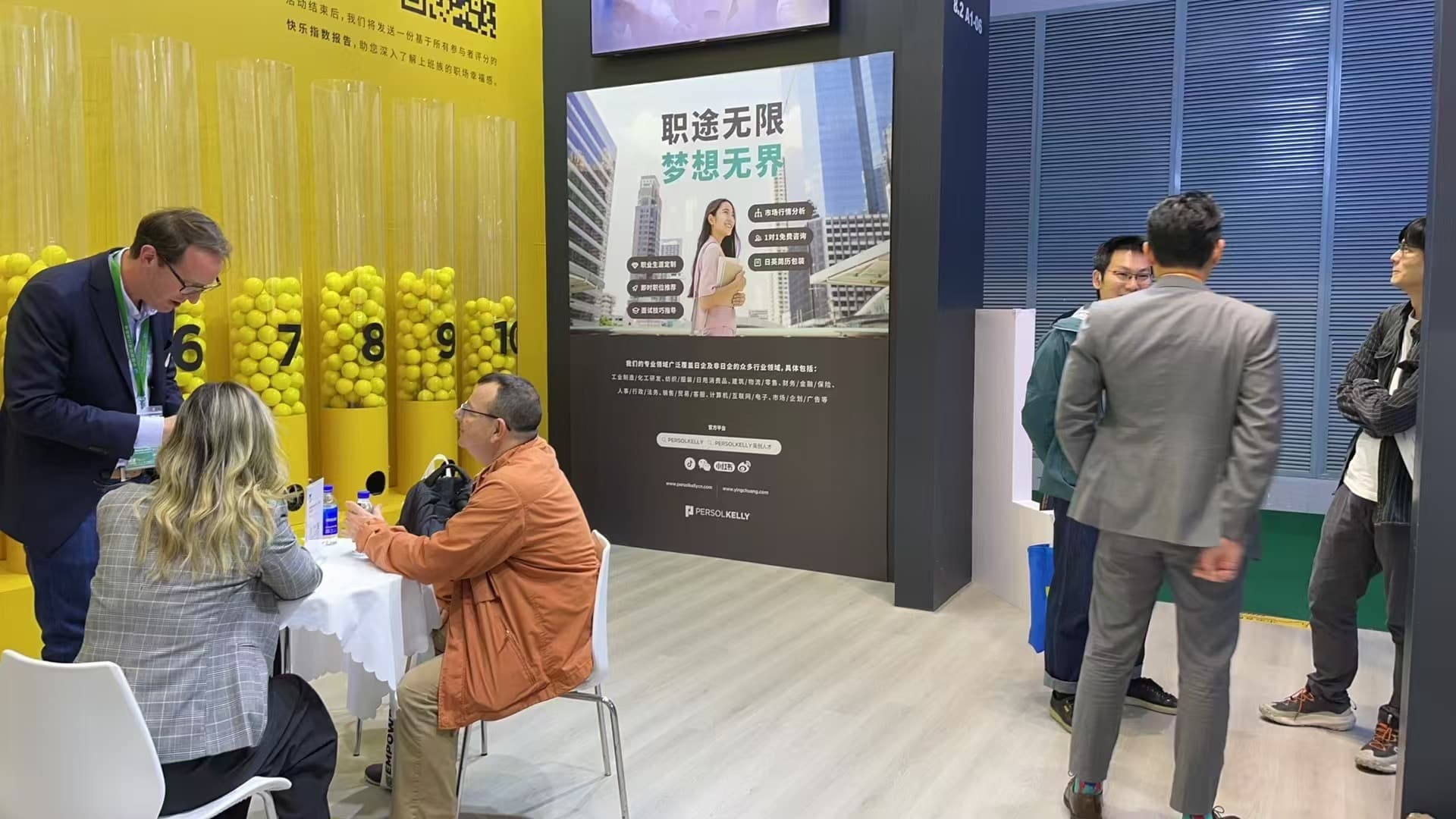 Visitors taking part in the exhibition booth activation